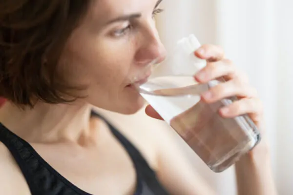 Coughing or choking while drinking water